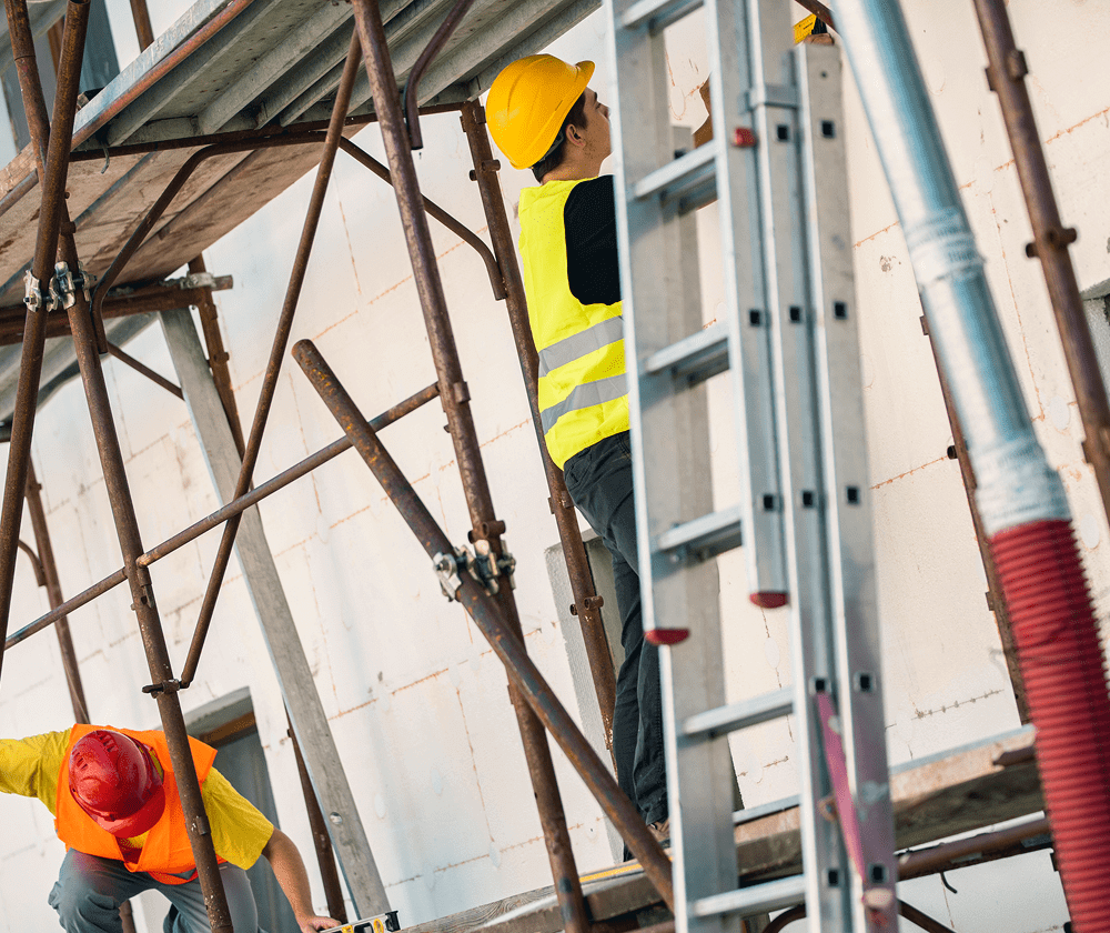 Construction workers on scaffolding