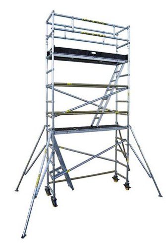 Mobile scaffold tower with wheels and safety rails.