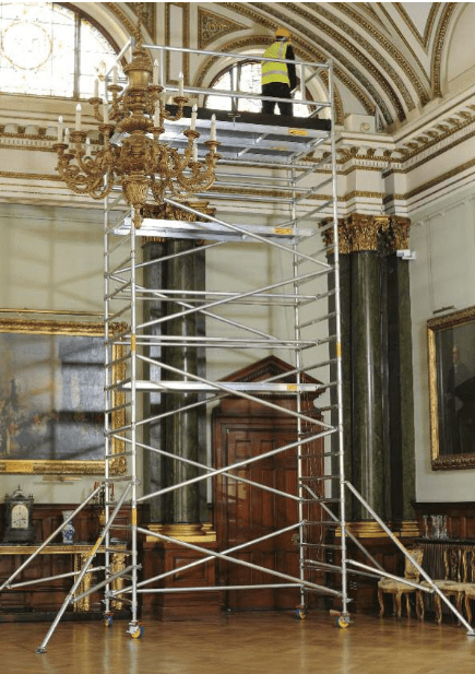 Scaffolding set up inside an ornate room for restoration work.