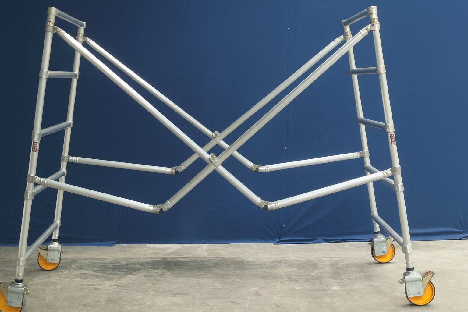 X-braced aluminum scaffold frame on casters
